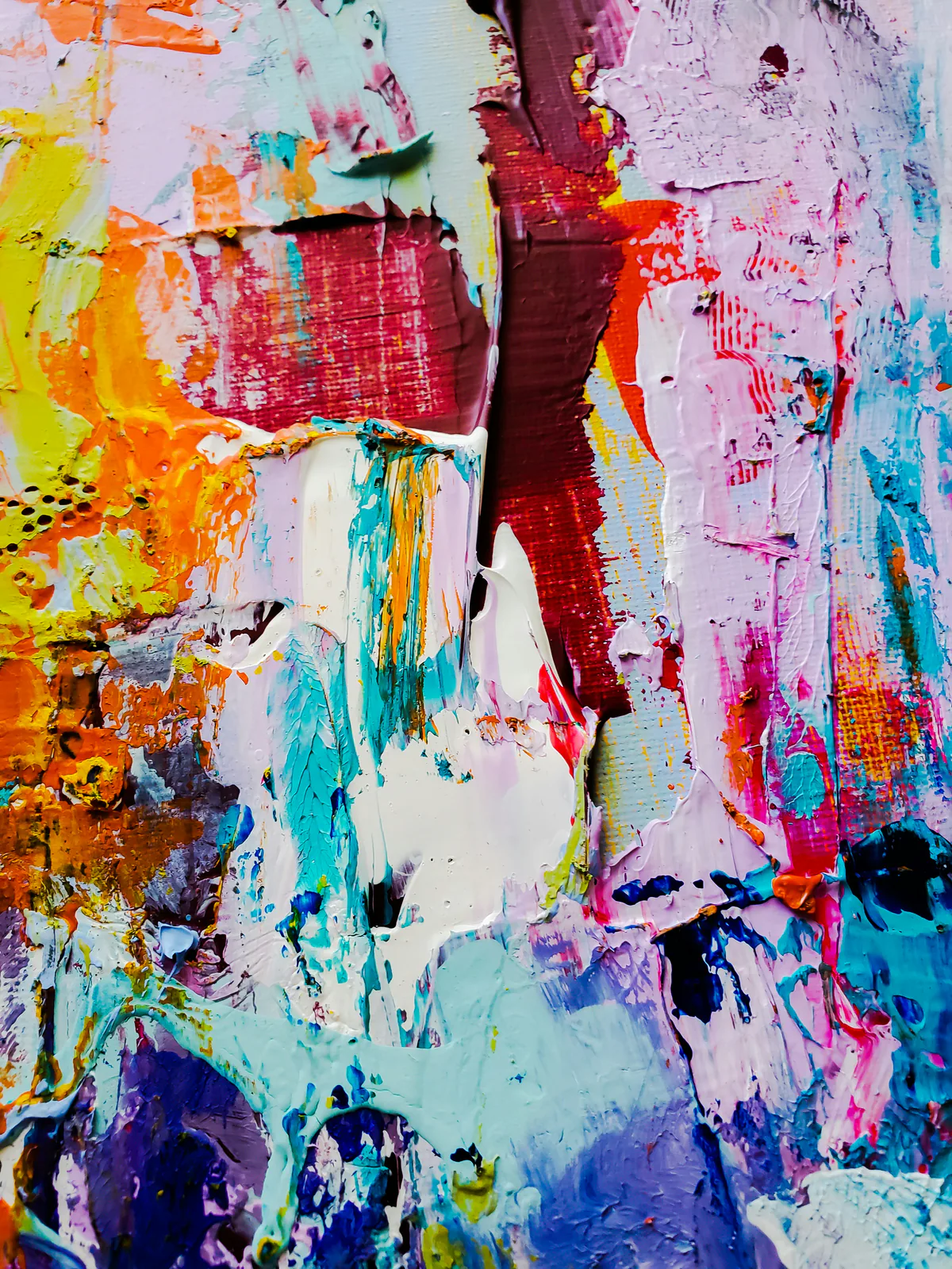 Layered turquoise, orange, and burgundy paint texture for gallery and collector services